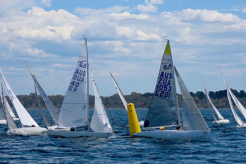 Peter Coleman AUS 1053 leading at the top mark in Race 8 photo copyright Christie Arras taken at Gippsland Lakes Yacht Club and featuring the 2.4m class