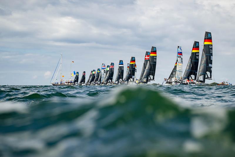 Late start of the 49erFX fleet in a sunny afternoon breeze at Kiel Week 2024 - photo © Sascha Klahn