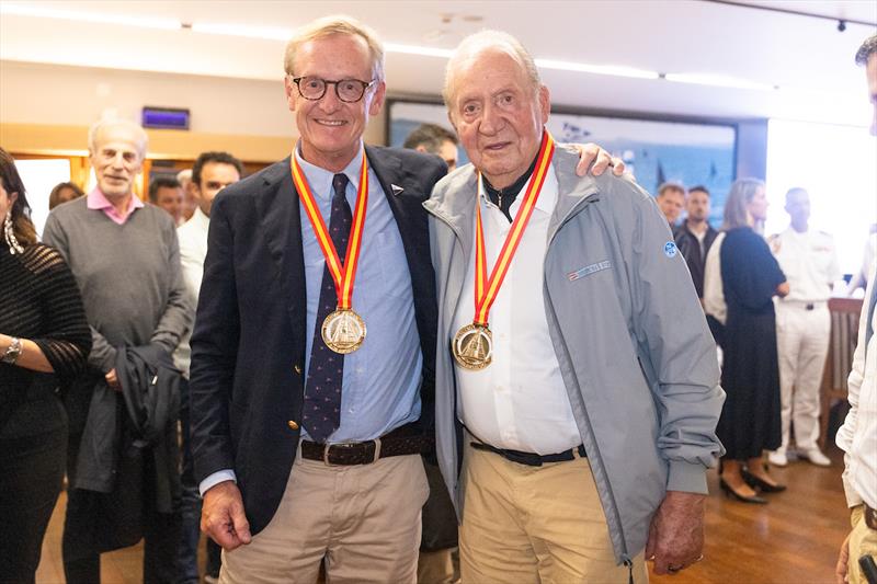 Henrik Andersin (L) and His Majesty King Juan Carlos of Spain (R) - Six Metre European Championship photo copyright SailingShots by Maria Muiña taken at Real Club Nautico de Sanxenxo and featuring the 6m class