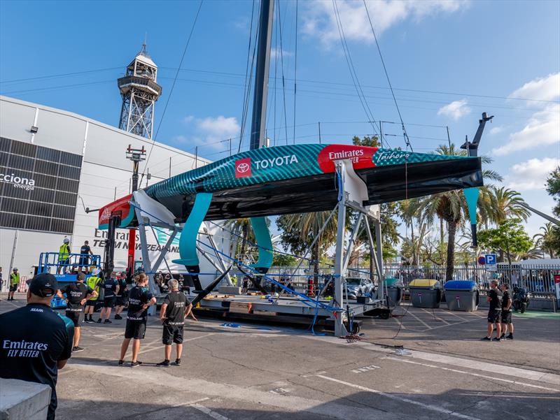 The Emirates Team New Zealand AC75 is damaged when the crane fails as they take it out of the water - photo © Emirates Team New Zealand