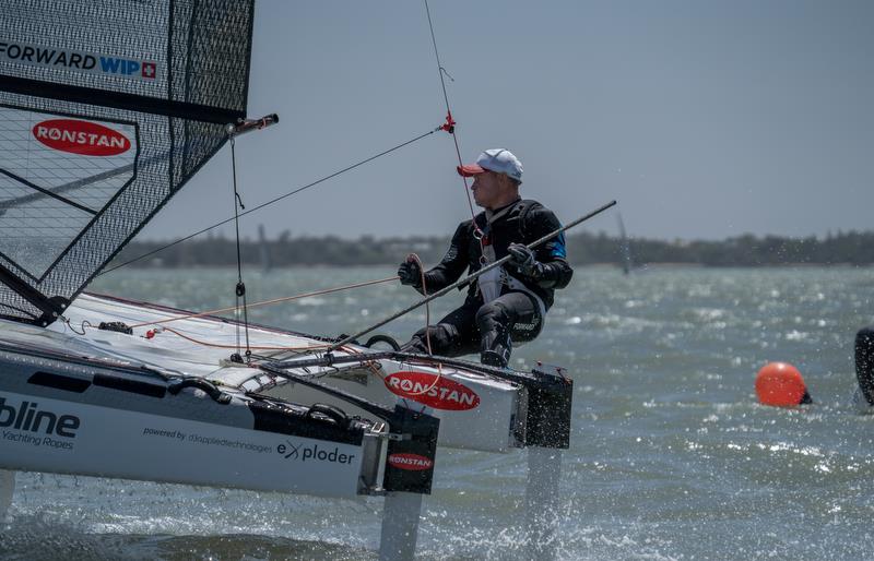 Emirates Team New Zealand sailor Glenn Ashby competing in the A-Class Catamaran World Championships in Hervey Bay, Queensland, Australia photo copyright Josh McCormack taken at Hervey Bay Sailing Club and featuring the A Class Catamaran class