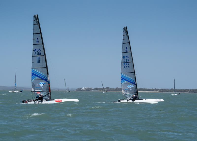 Emirates Team New Zealand's Glenn Ashby trails Blair Tuke  in the A-Class Catamaran World Championships in Hervey Bay, Queensland, Australia photo copyright Josh McCormack taken at Hervey Bay Sailing Club and featuring the A Class Catamaran class