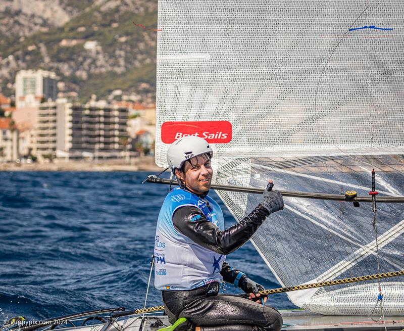 A-Class Cat Worlds - Kuba Surowiec, POL, is the reigning Open Champion, and is more than capable of retaining the title if things go well photo copyright Gordon Upton / www.guppypix.com taken at Centro Velico Punta Ala and featuring the A Class Catamaran class