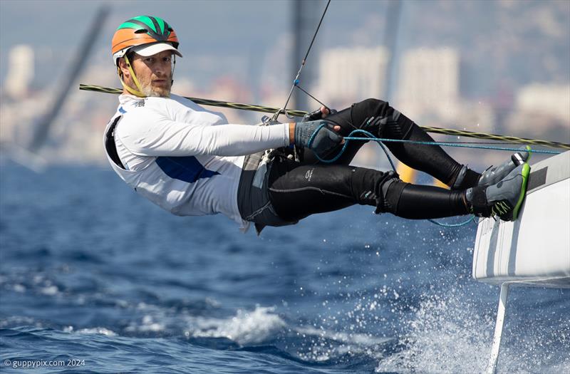 A-Class Cat Worlds - Italian Local Hero Lamberto Cesare could do well in home waters this year as he is on form currently photo copyright Gordon Upton / www.guppypix.com taken at Centro Velico Punta Ala and featuring the A Class Catamaran class