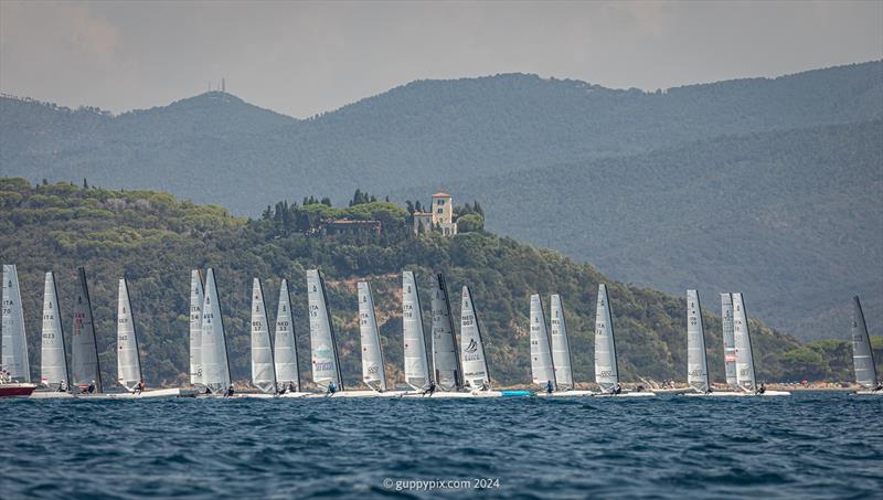 A Class Cat Regata Nazionale - The beautiful Tuscan coast at PuntAla Camping & Resort is showcasing high profile sailing events, first the Finn, now the A-Cat Worlds photo copyright Gordon Upton / www.guppypix.com taken at Centro Velico Punta Ala and featuring the A Class Catamaran class