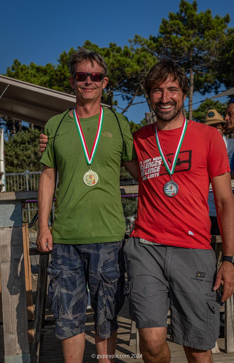 A Class Cat Regata Nazionale - Classic winner, Mathieu Verrier SUI (L) and runner up Francisco Mainero ITA photo copyright Gordon Upton / www.guppypix.com taken at Centro Velico Punta Ala and featuring the A Class Catamaran class