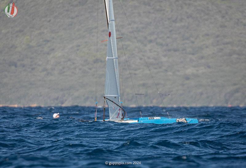 Veteran US sailing Legend Ben Hall USA 99, just hanging in there for a good mid-fleet finish in high end conditions - A Class Cat Worlds at Punta Ala day 1 - photo © Gordon Upton / www.guppypix.com