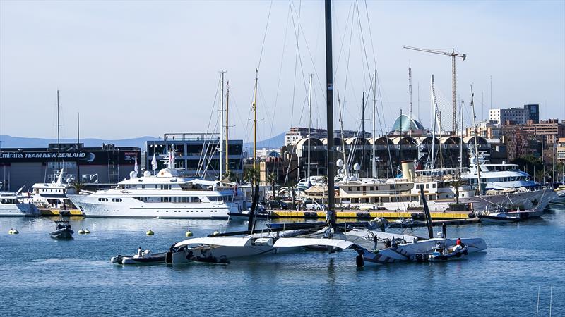 Alingi in the Darcena with superyachts. Emirates Team NZ's 2007 base in the left background - 33rd America's Cup - February 2010, Valencia, Spain - photo © Richard Gladwell / Sail-World.com / nz