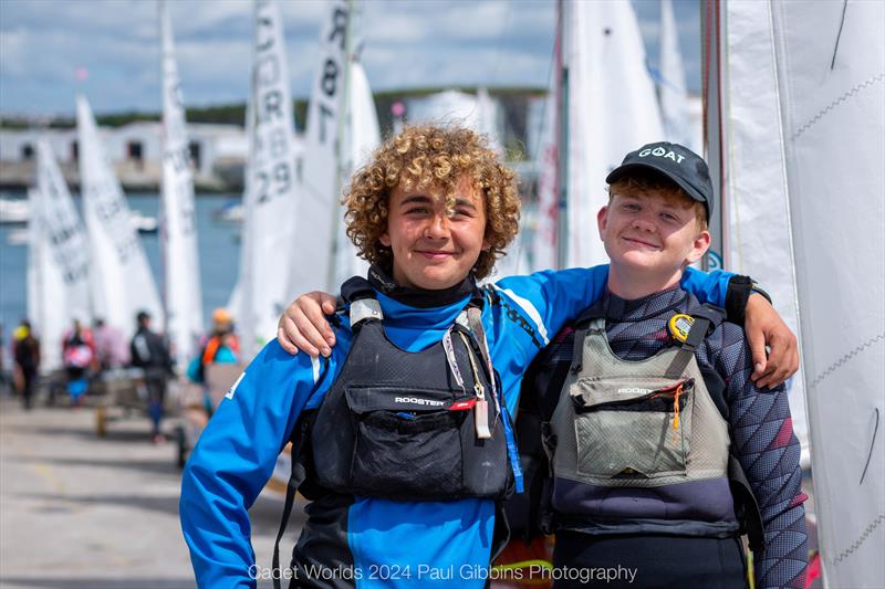 Teamwork and friendship - ABP Cadet class World Championship in Plymouth - Day 3 photo copyright Paul Gibbins Photography taken at Mount Batten Centre for Watersports and featuring the Cadet class