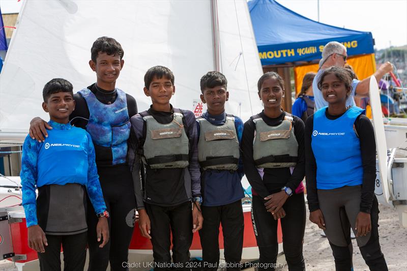 Indian team members - ABP Cadet class World Championship in Plymouth photo copyright Paul Gibbins Photography taken at Mount Batten Centre for Watersports and featuring the Cadet class