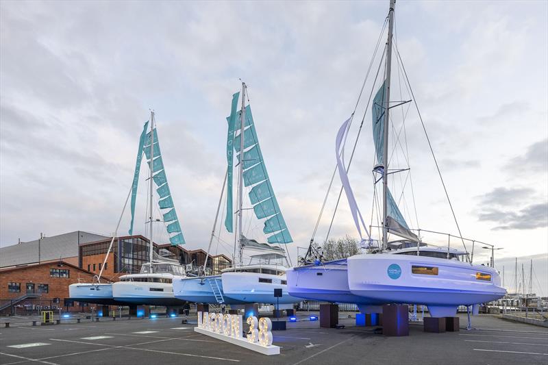 Lagoon 38 closest to camera and note the significant chines, plumb bows, and especially the shorter and deeper keelsons - photo © Lagoon Catamarans