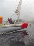 Catapult TT at Kielder Water - Wet, wet, wet: a rain-spattered John Terry (red bowboard) attacks Stuart Ede as they round the bottom mark © John Terry