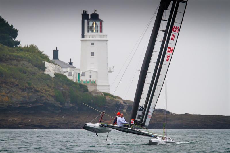 Day 2 at the C-Class Catamaran Championship photo copyright Tom Gruitt / www.tom-gruitt.co.uk taken at Restronguet Sailing Club and featuring the C Class Cat class