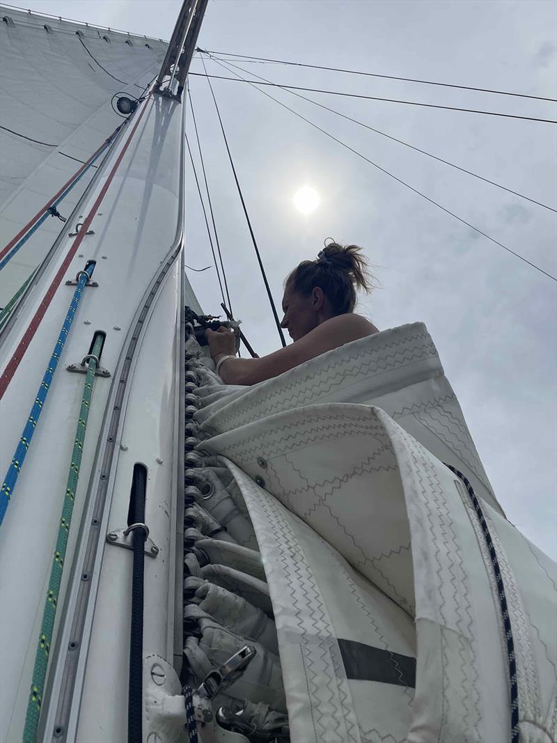 Mary on sail repair duties - Clipper Round the World Race - photo © Clipper Race