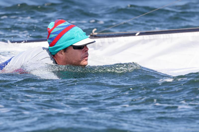 Some of the participants had to make the acquaintance of the 18-degree Baltic Sea on the Friday of Kiel Week, such as the Dane Nicholas Per Huffeldt next to his Contender, which did not dampen the overall good mood of almost all the participants photo copyright Christian Beeck taken at Kieler Yacht Club and featuring the Contender class