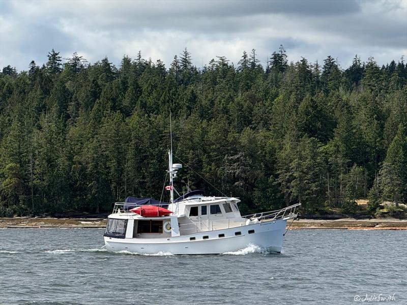 Kadey Krogen Evenstar leaving Clam Bay photo copyright Julie Smith taken at  and featuring the Cruising Yacht class