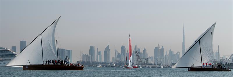 Canada SailGP team F50 sailing between the traditional sailing dhows during a demonstration event ahead of the Dubai Sail Grand Prix presented by P&O Marinas in Dubai, United Arab Emirates - photo © Ricardo Pinto for SailGP