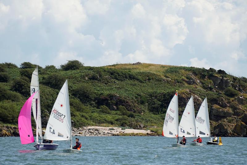 Fast handicap winner Toby Iglehart leads the ILCA4 fleet and the RS200 of Tamsin Wallace and Mollie Keiley - Solway Yacht Club's Cadet Week - photo © Finlay Train