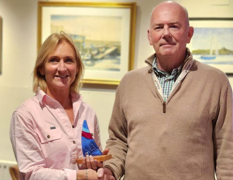 ILCA 6s - 1st Lady (and 4th Overall) Shirley Gilmore, with DMYC Commodore Derek Gill. Viking Marine Frostbites Series Series 1 prize-giving photo copyright Frank Miller taken at Dun Laoghaire Motor Yacht Club and featuring the Dinghy class