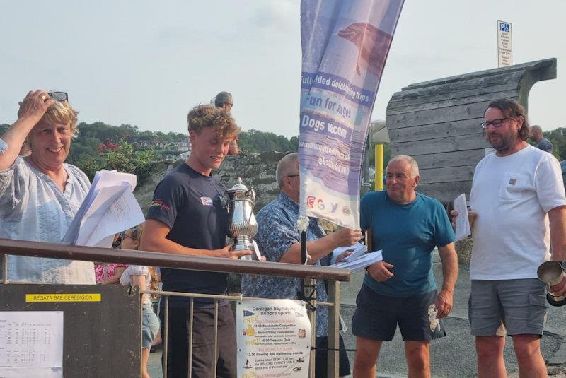 Henry Powell, Martin Wood and Iain Wilson collecting silverware - Cardigan Bay Regatta at New Quay YC photo copyright Tilly Andrews taken at New Quay Yacht Club and featuring the Dinghy class