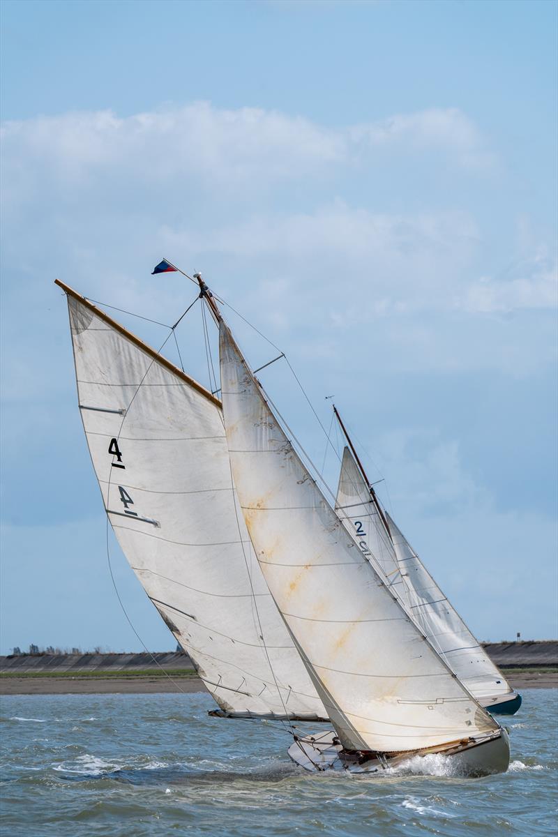 East Coast One Design boats compete during Burnham Week 2024  photo copyright Petru Balau Sports Photography / sports.hub47.com taken at Royal Corinthian Yacht Club, Burnham and featuring the East Coast One Design class