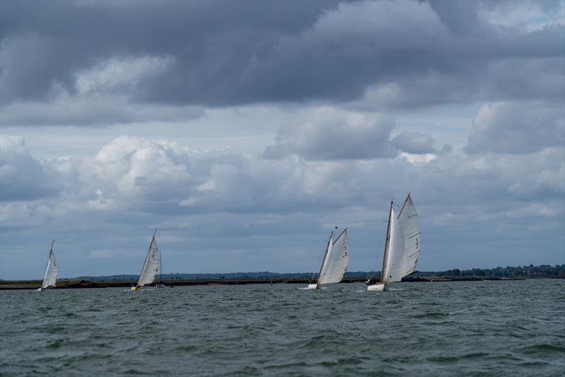 David Smith's East Coast One Design Wizard leads the fleet during Burnham Week 2025 - photo © Petru Balau Sports Photography / sports.hub47.com