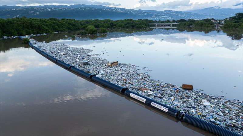 An Ocean Cleanup Interceptor at work in Jamaica photo copyright The Ocean Cleanup taken at Alice River Anglers Club and featuring the Environment class