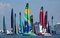 The SailGP fleet in action with Mubadala Brazil SailGP Team and Canada NorthStar SailGP Team in the foreground during racing on Race Day 1 of the Emirates Dubai Sail Grand Prix - November 23, 2024 © Simon Bruty/SailGP