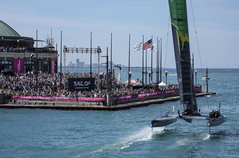 Australia SailGP Team helmed by Tom Slingsby celebrate winning by sailing by spectators on Navy Pier on Race Day 2 of the T-Mobile United States Sail Grand Prix | Chicago at Navy Pier, Lake Michigan, Season 3, in Chicago, Illinois, USA. 19th June 2022 photo copyright Simon Bruty for SailGP taken at Chicago Yacht Club and featuring the F50 class