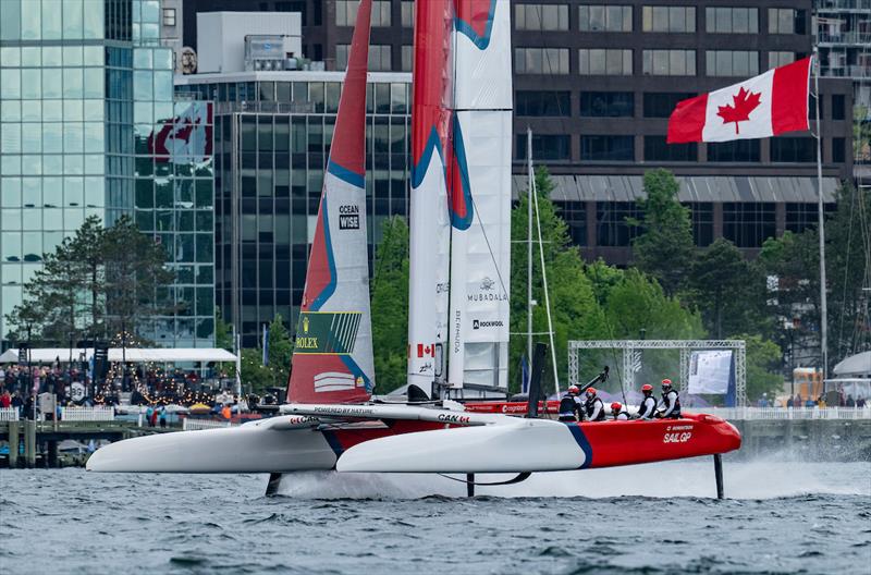 Canada SailGP Team helmed by Phil Robertson sail past the shore during a practice session - Halifax - May 2024 - photo © Ricardo Pinto / SailGP