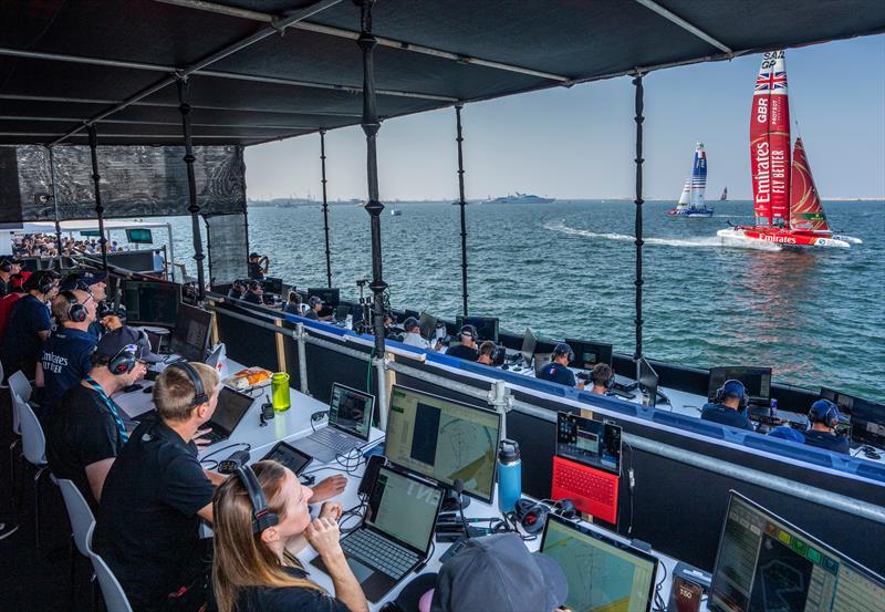 Emirates Great Britain SailGP Team helmed by Ben Ainslie sail past the Team Coach Boxes and Race Management Platform on Race Day 1 of the Emirates Sail Grand Prix  photo copyright Adam Warner for SailGP taken at Dubai Offshore Sailing Club and featuring the F50 class