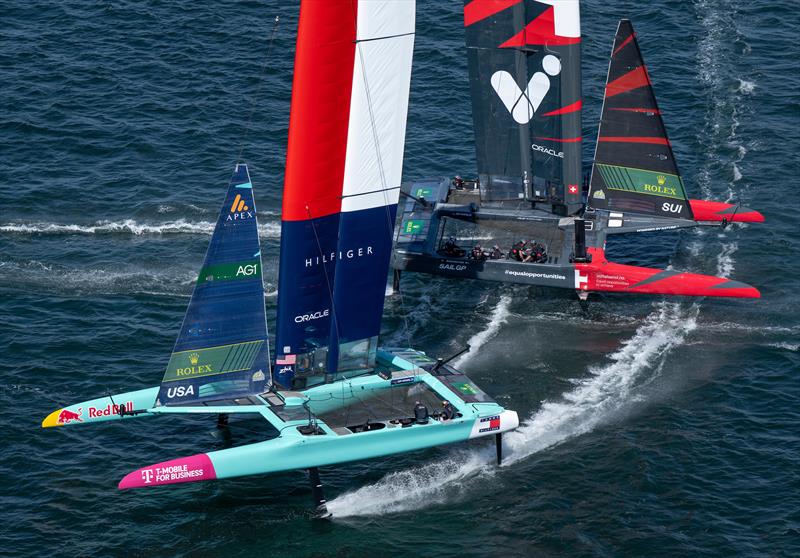 USA SailGP Team helmed by Taylor Canfield sails close past Switzerland SailGP Team during racing on Race Day 1 of the Rolex Los Angeles Sail Grand Prix - photo © Ricardo Pinto for SailGP