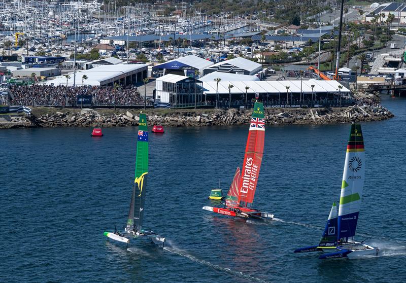 Emirates Great Britain SailGP Team and Australia SailGP Team sail past the finish line in front of the grandstand during racing on Race Day 1 of the Rolex Los Angeles Sail Grand Prix photo copyright Ricardo Pinto for SailGP taken at  and featuring the F50 class