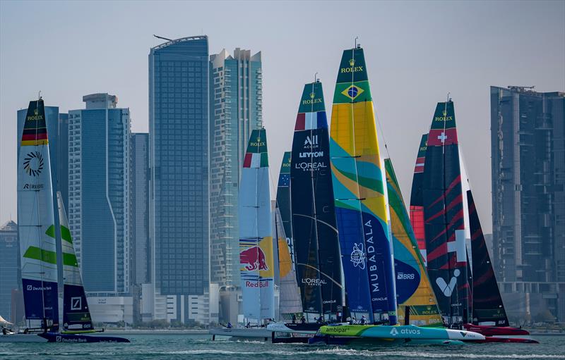Fleet action against the City backdrop - Day 1 -  Mubadala Abu Dhabi Sail Grand Prix Season Grand Final - November 29, 2025 photo copyright Bob Martin/SailGP taken at Abu Dhabi Marine Sports Club and featuring the F50 class