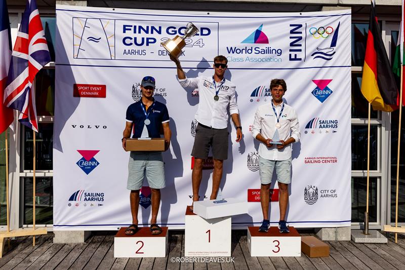 Finn Silver Cup podium - 2024 Finn Gold Cup day 5 photo copyright Robert Deaves taken at Sailing Aarhus and featuring the Finn class