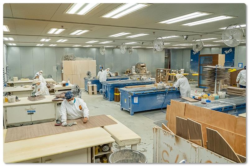 Like every work area in the plant, the sanding booth in the Mill teems with concentrated energy photo copyright Viking Yachts taken at  and featuring the Fishing boat class