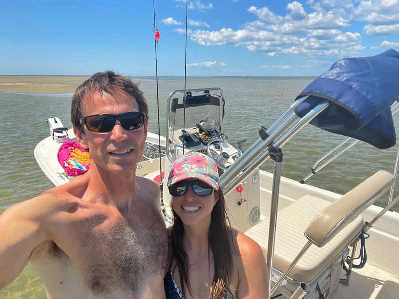 Chris (left) and Jeanne-Marie (right) with their boat in the Outer Banks of North Carolina. - photo © Wavve Boating