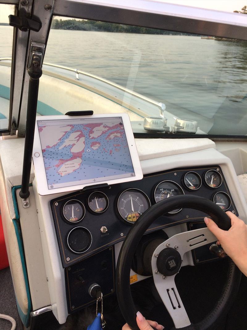 Wavve user with Wavve Boating app open and in-use while navigating near Lake Ontario. - photo © Wavve Boating
