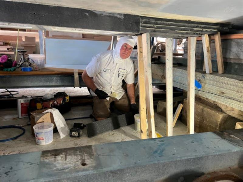 Hull #7 - Glenn on transducer installation - photo © Michael Rybovich & Sons