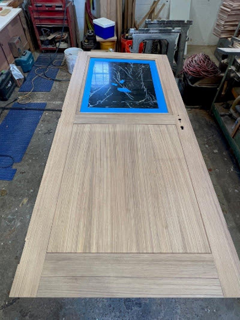 Hull #7 - Finished day head door - photo © Michael Rybovich & Sons