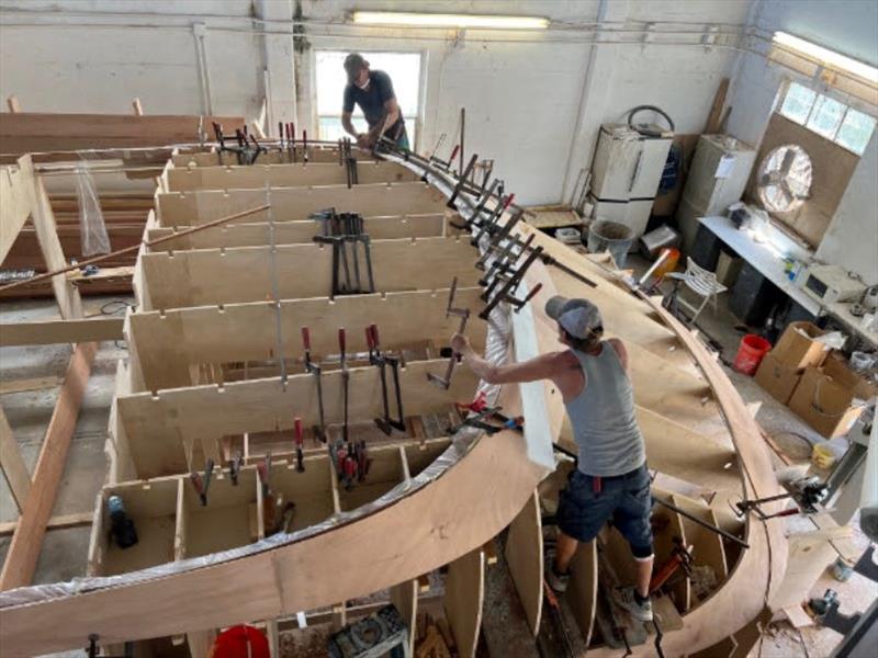 Hull #9 - Flipper and Scott, laminating windshield - photo © Michael Rybovich & Sons