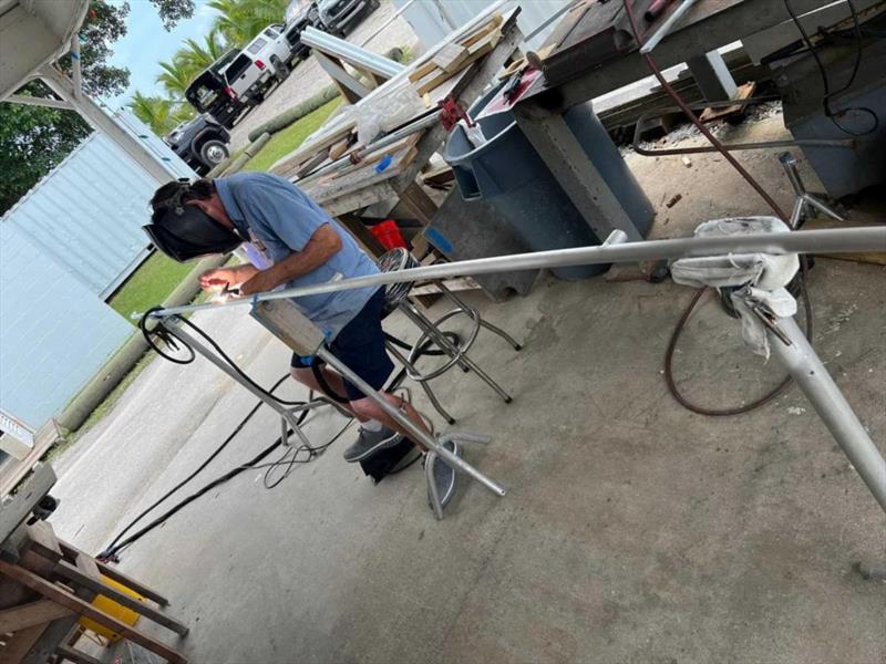 Hull #7 - Brian D welding grab rails - photo © Michael Rybovich & Sons