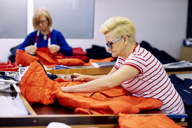 Working on the Mav HL Liner Hood Jacket at the Henri-Lloyd factory in Poland - photo © Henri-Lloyd