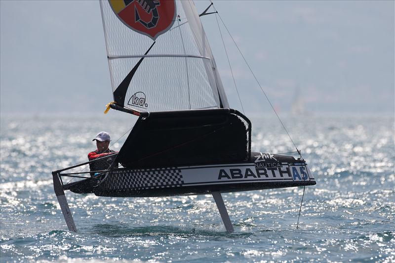 Simon Payne on day 6 of the Zhik Nautica Moth Worlds at Campione del Garda photo copyright Th.Martinez / Sea&Co / www.thmartinez.com taken at Vela Club Campione del Garda and featuring the International Moth class