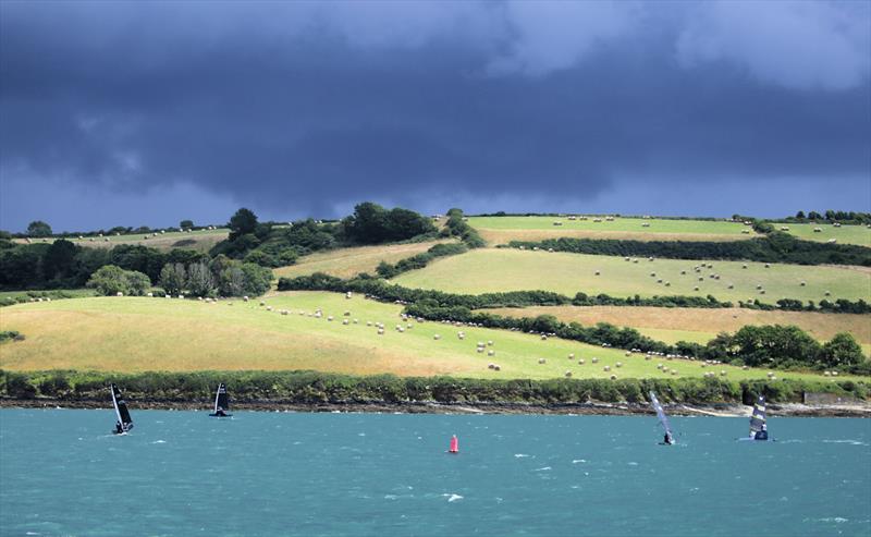 Storm clouds come in during Race 9 on Day 2 of the Wetsuit Outlet International Moth UK Nationals photo copyright Mark Jardine / IMCAUK taken at Restronguet Sailing Club and featuring the International Moth class