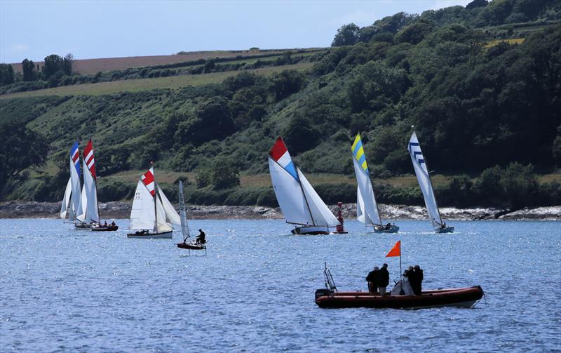 Moth foiling past the Falmouth Workboats on Day 3 of the Wetsuit Outlet International Moth UK Nationals - photo © Mark Jardine / IMCAUK