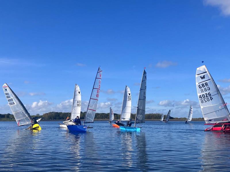 The UFB (dark blue hull) during the International Moth Lowriders `Burton Rinse Cycle` Inlands photo copyright Paul Kelly taken at Burton Sailing Club and featuring the International Moth class