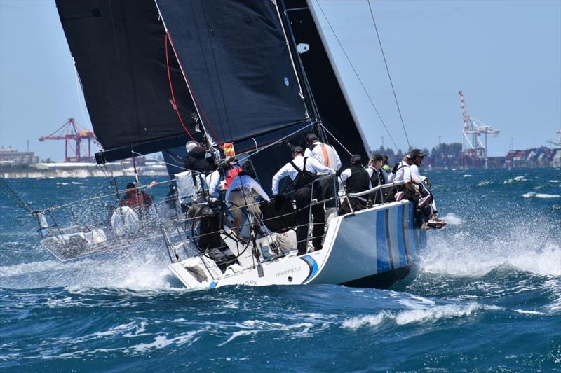 Obsession chasing photo copyright Suzzi Ghent taken at Royal Freshwater Bay Yacht Club and featuring the IRC class