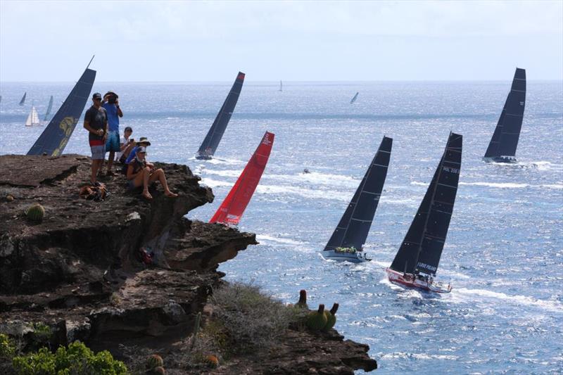 Hundreds of spectators, on and off the water watched the IRC Super Zero yachts head off in the 13th RORC Caribbean 600 - photo © Tim Wright / www.photoaction.com