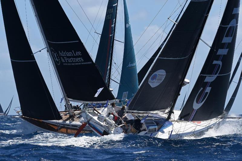 Charles-Louis Mourruau's Class40 Guidi and Adrian Lee's Swan 60 Lee Overlay Partners at the start of the 13th RORC Caribbean 600 photo copyright Rick Tomlinson / www.rick-tomlinson.com taken at Antigua Yacht Club and featuring the IRC class